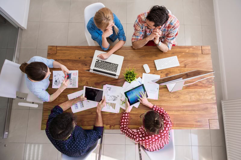 top-view-coworkers-team-working-at-office